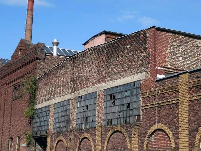 Historic brick commercial building illustrating the type of older property that benefits from an ALTA Survey before purchase and redevelopment.
